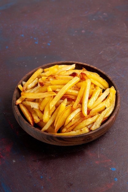 Front view fried potatoes tasty french fries inside plate on dark desk food meal dinner dish ingredients potato