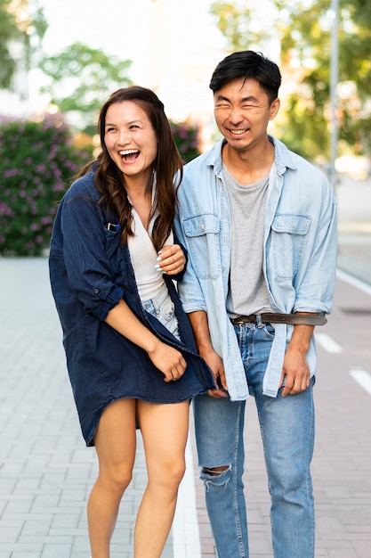 Front view friends laughing together