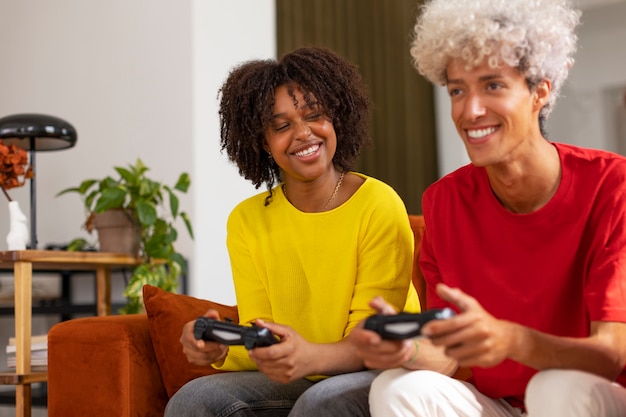 Front view friends playing videogames