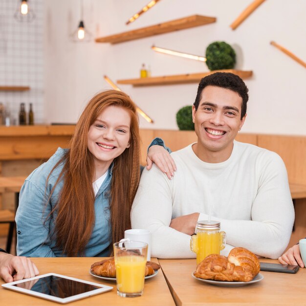 Front view of friends spending time together