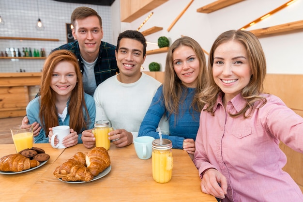 Front view of friends spending time together