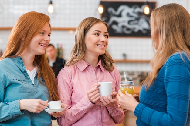 Free photo front view of friends spending time together