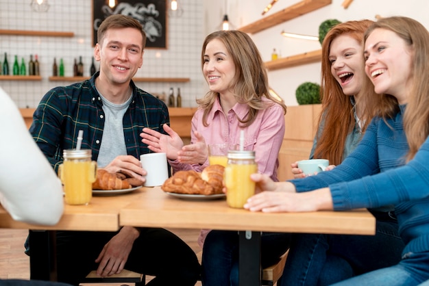 Front view of friends spending time together