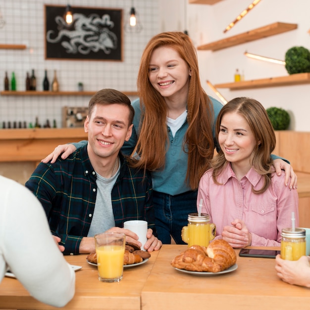 Front view of friends spending time together