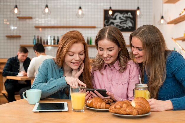 Front view of friends spending time together