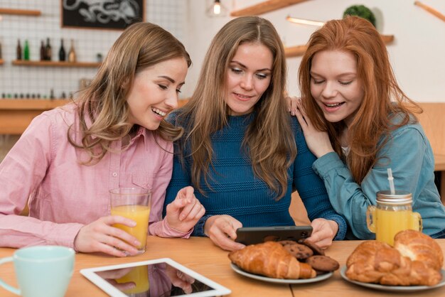 Front view of friends spending time together