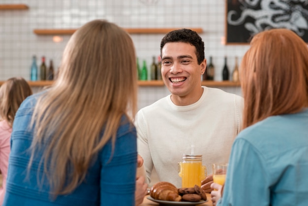 Front view of friends spending time together