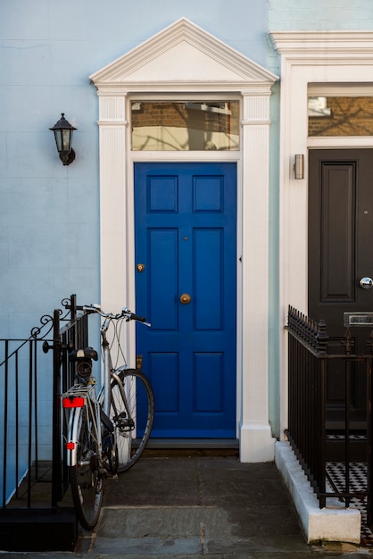 Front view of front door with blue wall