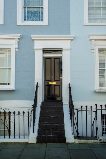 Front view of front door with blue wall