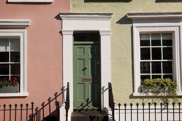 Front view of front door with orange and beige wall