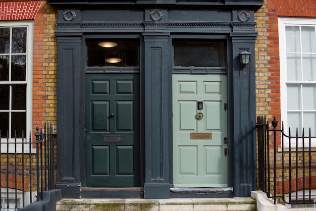 Front view of front doors with brown wall