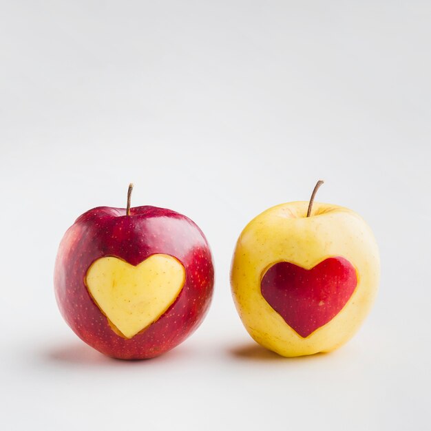 Front view of fruit heart shapes on apples