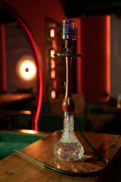 Front view full shot of hookah in cafe light