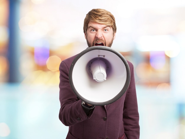 Front view of furious executive with a megaphone