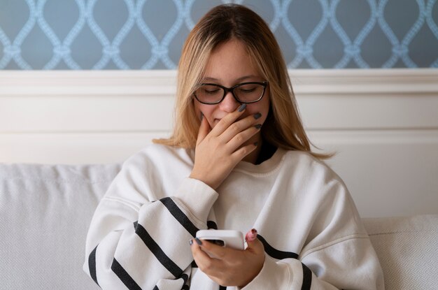 front view girl holding smartphone