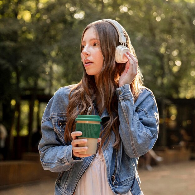 Front view girl listening music