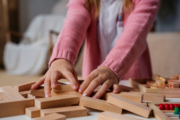 Front view girl playing memory game