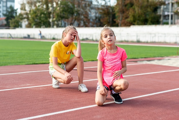 Free photo front view of girl on running track