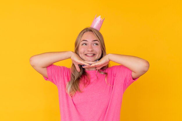 Front view of girl wearing a crown concept