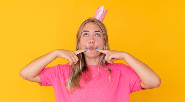 Front view of girl wearing a crown concept