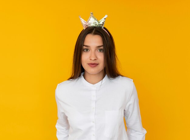 Front view of girl wearing a crown concept