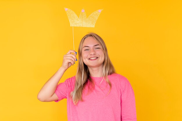 Front view of girl wearing a crown with copy space