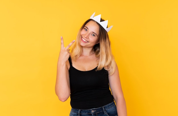 Front view of girl wearing a crown with copy space