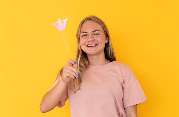 Front view of girl wearing a crown with copy space