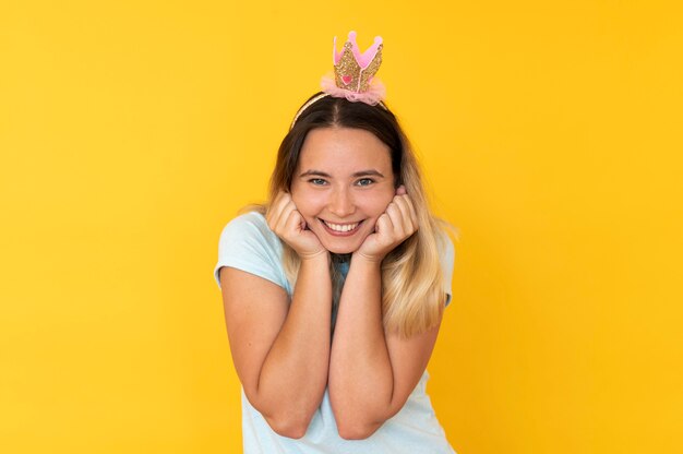 Front view of girl wearing a crown with copy space