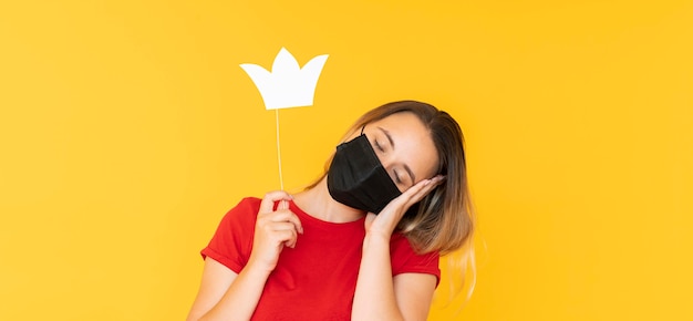 Free photo front view of girl wearing a crown with copy space