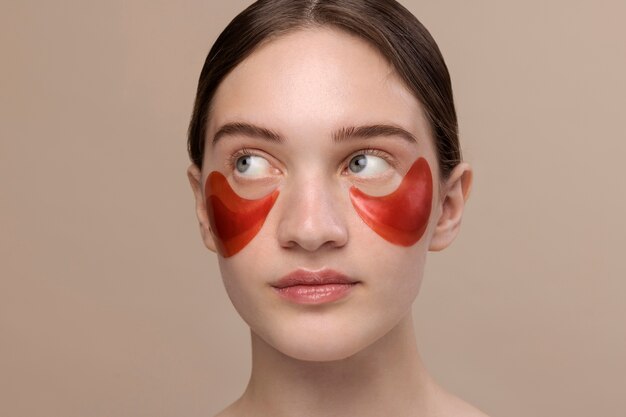 Front view girl wearing eye patches