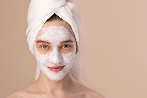 Front view girl with hydrating face mask