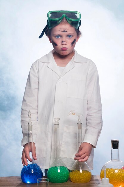 Front view girl with lab coat and glasses