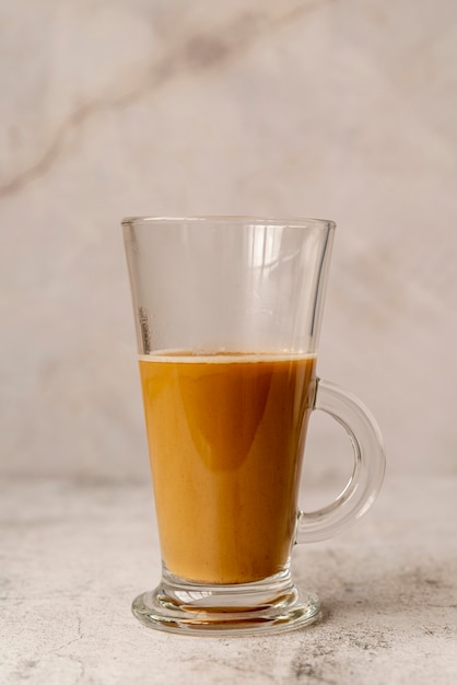 Front view glass of milk coffee