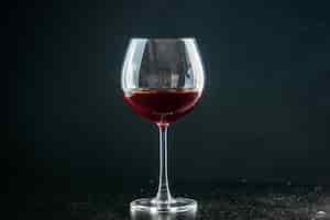 無料写真 暗い飲み物の写真の色のシャンパン クリスマス アルコールのワインのフロント ビュー グラス