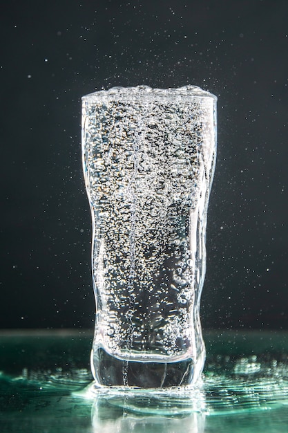 Front view glass of soda full on dark drink photo champagne xmas water