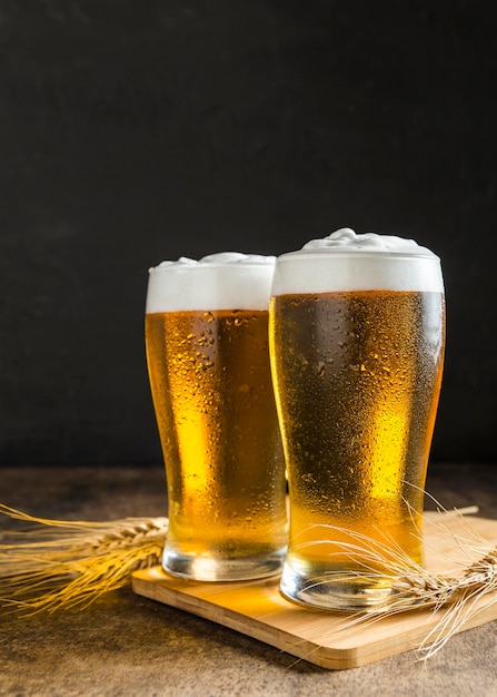 Front view of glasses of beer with wheat