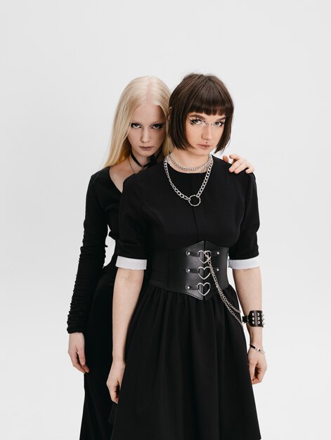 Front view goth girls posing in studio