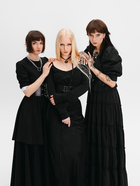 Front view goth girls posing in studio