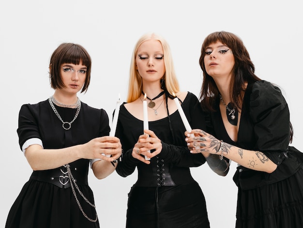 Front view goth girls posing in studio