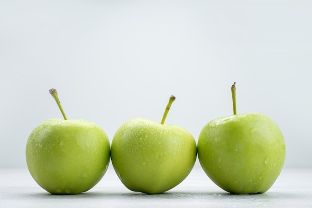 front view green apples lined on white fruit mellow juice food meal