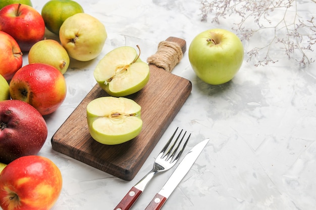 Front view green apples with other fruits on white table apple fruit ripe pear fresh