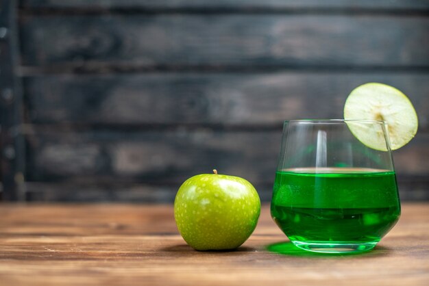 Front view green feijoa juice with green apple on wooden desk bar fruit color drink photo cocktail