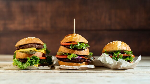 Front view hamburgers on table