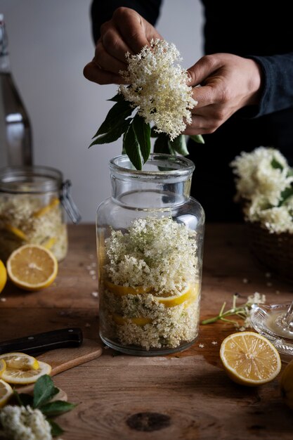 Front view hands holding flowers