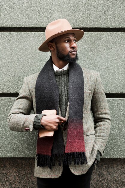 Front view handsome man in grey jacket posing