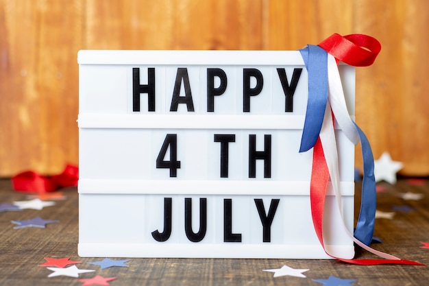 Free photo front view happy 4th july sign