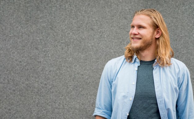 Front view of happy man smiling with copy space