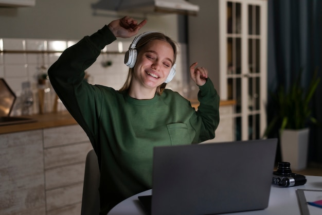 Front view of happy woman dancing