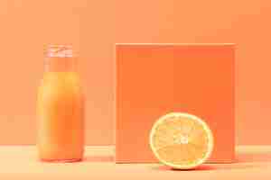 Free photo front view healthy smoothie and orange